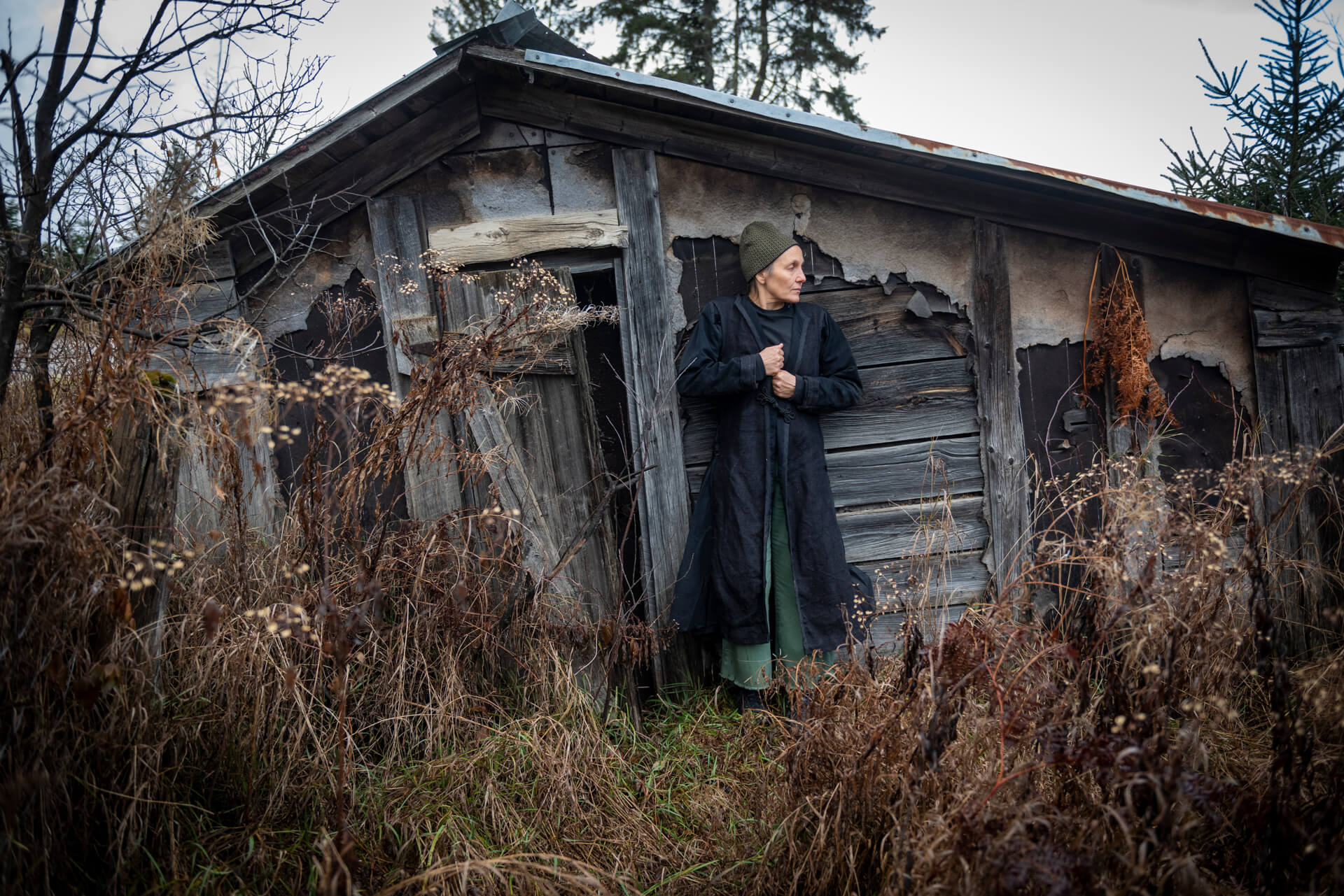 standing infront shack 2