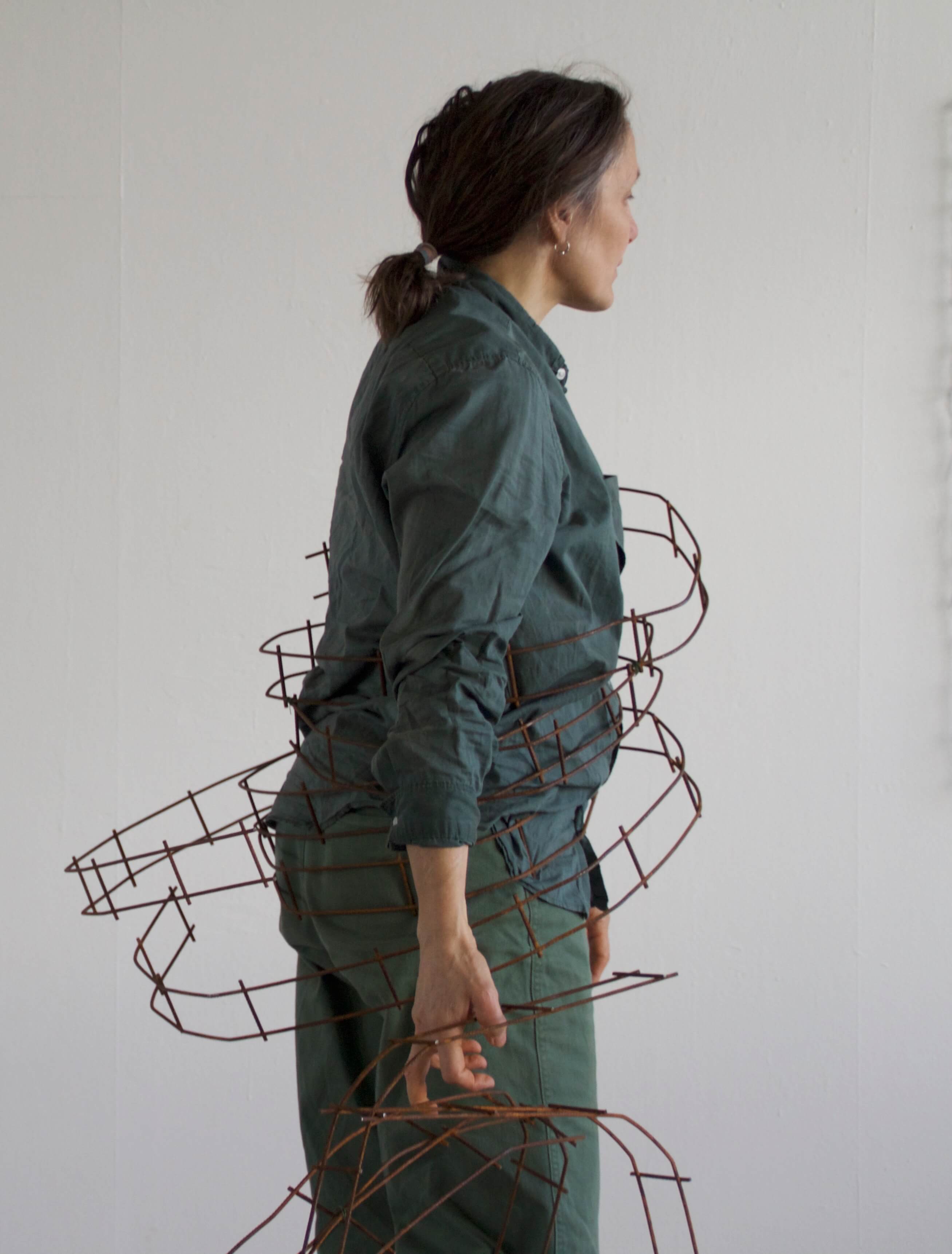 sideview of tracks wrapped around torso